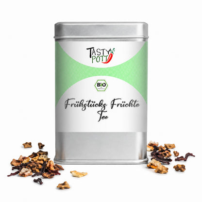 Frontansicht der Bio Frühstücks Früchte Tee Dose von Tasty Pott, gefüllt mit aromatischer Mischung aus Apfel, Hibiskus und schwarzem Darjeeling-Tee.